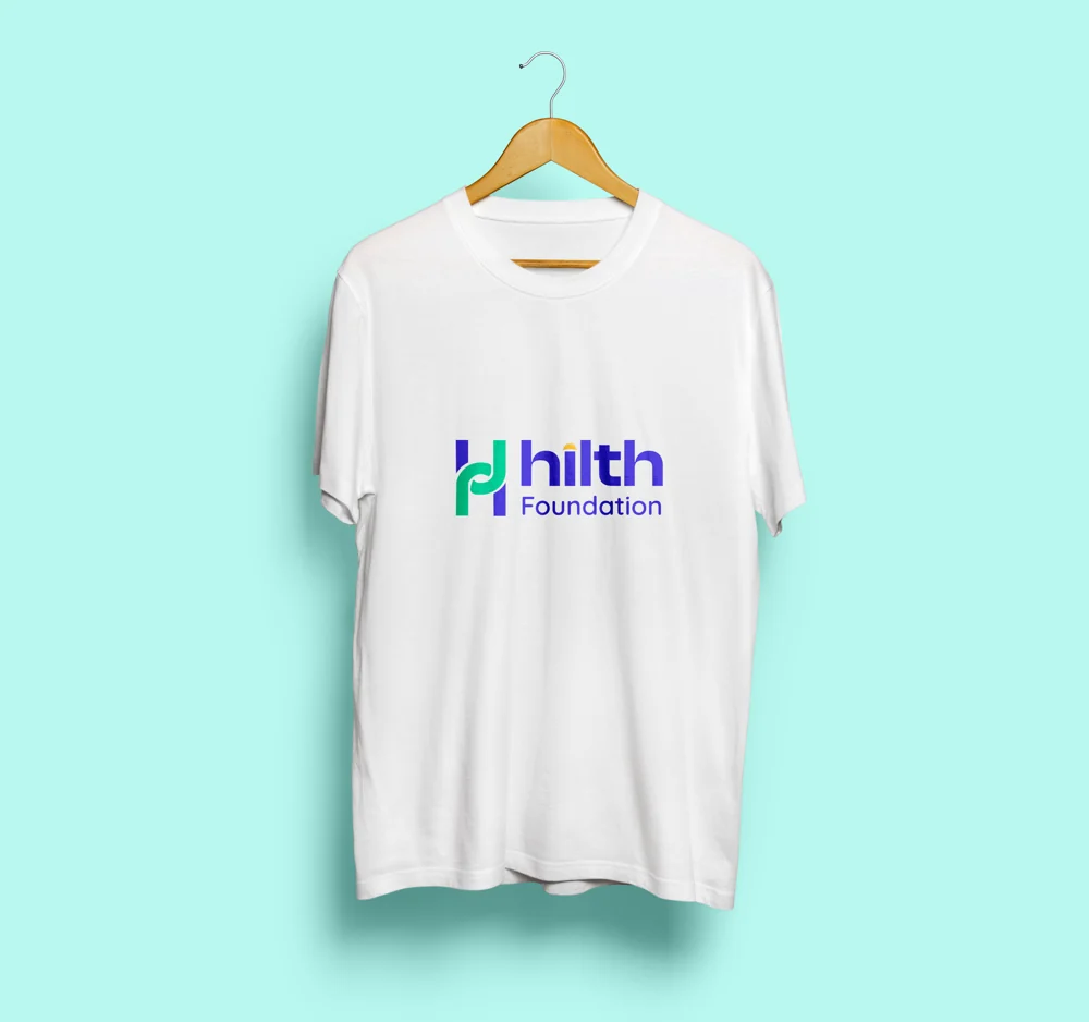 Hilth white T-shirt design with the Foundation logo on the front